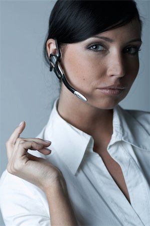 simsearch:400-03954172,k - Beautiful and sexy brunette business woman talking telephone. She is isolated on clear background Stock Photo - Budget Royalty-Free & Subscription, Code: 400-03954149