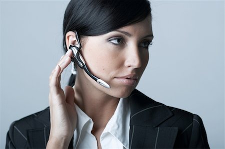 simsearch:400-03954172,k - Beautiful and sexy brunette business woman talking telephone. She is isolated on clear background Stock Photo - Budget Royalty-Free & Subscription, Code: 400-03954140