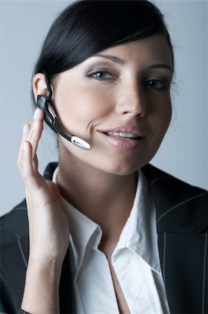 simsearch:400-03954172,k - Beautiful and sexy brunette business woman talking telephone. She is isolated on clear background Stock Photo - Budget Royalty-Free & Subscription, Code: 400-03954143