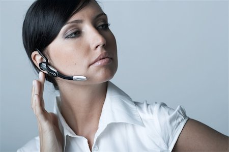simsearch:400-03954172,k - Beautiful and sexy brunette business woman talking telephone. She is isolated on clear background Stock Photo - Budget Royalty-Free & Subscription, Code: 400-03954155