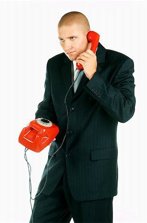 simsearch:400-03954954,k - A Young businessman with red classic telephone Foto de stock - Super Valor sin royalties y Suscripción, Código: 400-03954967