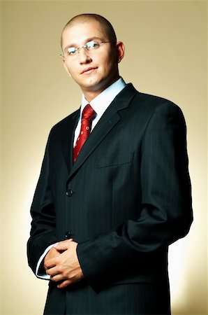 simsearch:400-03954954,k - A businessman wearing black suit and red tie Foto de stock - Super Valor sin royalties y Suscripción, Código: 400-03955064