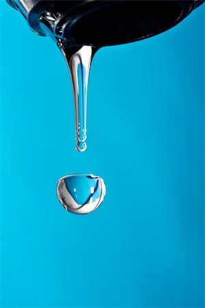 simsearch:696-03396859,k - Water drop macro on blue background. Stock Photo - Budget Royalty-Free & Subscription, Code: 400-03956067
