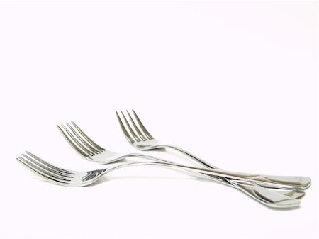 simsearch:400-03912740,k - three forks on white background Photographie de stock - Aubaine LD & Abonnement, Code: 400-03956086