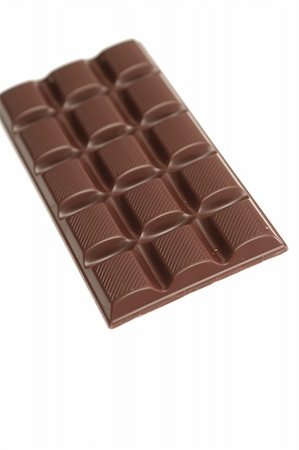 Tile of tasty chocolate on a white background Stockbilder - Microstock & Abonnement, Bildnummer: 400-03956099