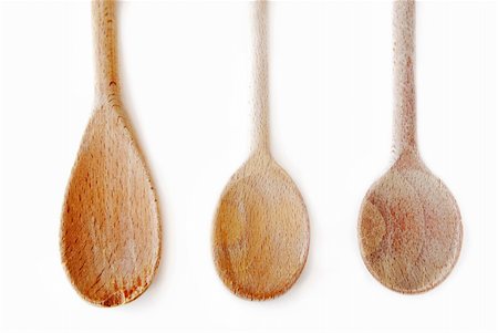 Old wooden cooking spoons isolated on white background Stock Photo - Budget Royalty-Free & Subscription, Code: 400-03956151
