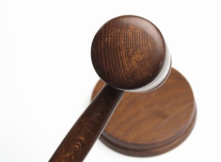 simsearch:693-06021036,k - judge's gavel,close up over white Stockbilder - Microstock & Abonnement, Bildnummer: 400-03956633