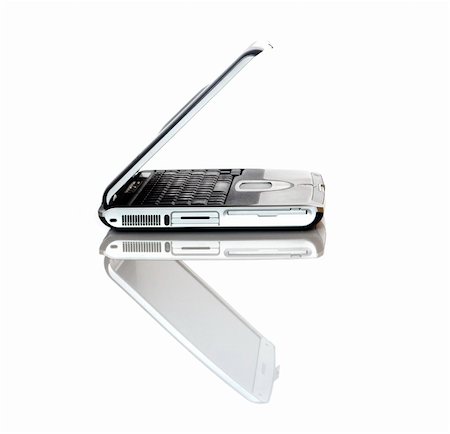 simsearch:400-06639907,k - Silver Laptop pc on white with reflection Stock Photo - Budget Royalty-Free & Subscription, Code: 400-03956867