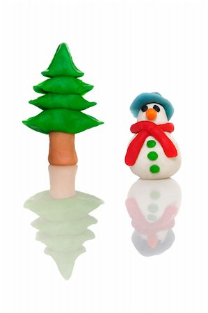 Chrsitmas snow man made of plastince with reflection Foto de stock - Super Valor sin royalties y Suscripción, Código: 400-03956872