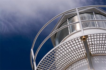 Looking up at a lighthouse on the East Coast Trail, on the east coast of Newfoundland near Bay Bulls. Stockbilder - Microstock & Abonnement, Bildnummer: 400-03956914