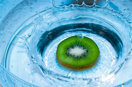 fruit dropping into water - Splash kiwi slice Stock Photo - Budget Royalty-Free & Subscription, Code: 400-03956928
