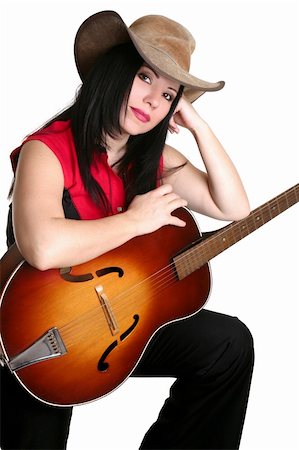simsearch:400-05263090,k - A woman in western clothing rests casually with a guitar. Foto de stock - Super Valor sin royalties y Suscripción, Código: 400-03957237