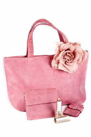 simsearch:695-05778940,k - Assortment of pink handbags and lipstick on white background Fotografie stock - Microstock e Abbonamento, Codice: 400-03957483