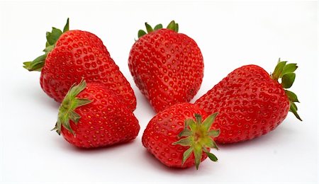 simsearch:400-06135772,k - Five Strawberries, focus on the strawberry in front. On white background Fotografie stock - Microstock e Abbonamento, Codice: 400-03957600