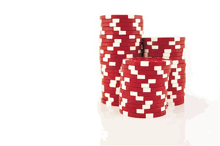 3 part stacks of red casino chips isolated on a white background Stock Photo - Budget Royalty-Free & Subscription, Code: 400-03957697