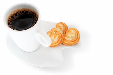 simsearch:649-07647842,k - White coffee cup with heart=shaped biscuits over white background Foto de stock - Super Valor sin royalties y Suscripción, Código: 400-03957844