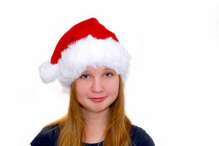 simsearch:693-06435904,k - Portrait of a young girl wearing Santa's hat isolated on white background Foto de stock - Royalty-Free Super Valor e Assinatura, Número: 400-03958038