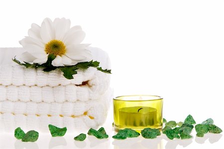 simsearch:400-05326817,k - Towels, candle, and daisy on white isolated Stock Photo - Budget Royalty-Free & Subscription, Code: 400-03950248