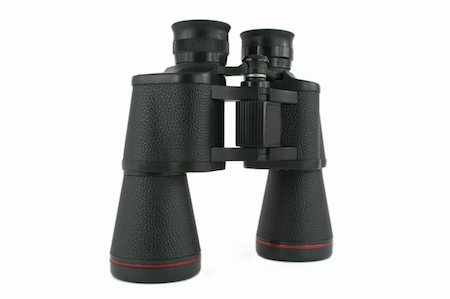 person focusing telescope - an image of a pair of black binoculars Stock Photo - Budget Royalty-Free & Subscription, Code: 400-03950604