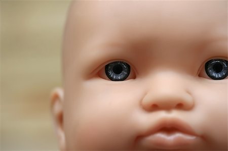 simsearch:400-03945849,k - A close up a plastic doll face with blue eyes Foto de stock - Royalty-Free Super Valor e Assinatura, Número: 400-03950615