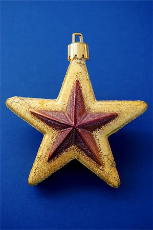 simsearch:400-07679396,k - Christmas tree decoration. Golden star ornament background. Foto de stock - Super Valor sin royalties y Suscripción, Código: 400-03950962