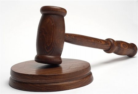 simsearch:693-06021036,k - judge's gavel,close up over white Stockbilder - Microstock & Abonnement, Bildnummer: 400-03951095