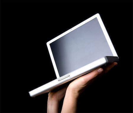 prize (winning gift or money) - Laptop with blank screen - presented with a pair of hands Stock Photo - Budget Royalty-Free & Subscription, Code: 400-03951241