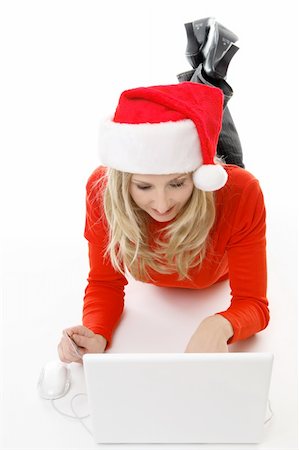 A relaxed female shopping online for gifts Stock Photo - Budget Royalty-Free & Subscription, Code: 400-03952137