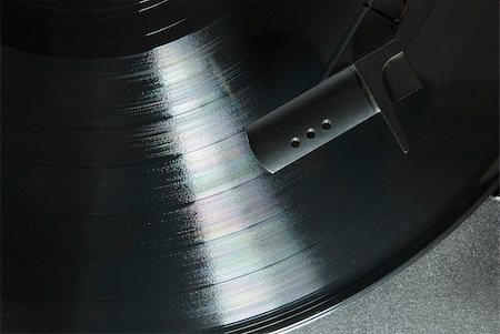 Cropped image shot directly from above of a record player needle, with LP underneath Stockbilder - Microstock & Abonnement, Bildnummer: 400-03952703