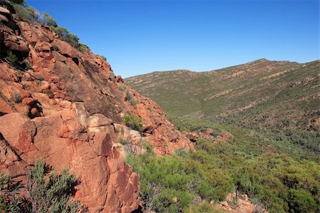 parc national flinders ranges - Section of Wilpena Pound, a vast elevated basin almost totally enclosed by rugged rock walls in South Australia. Photographie de stock - Aubaine LD & Abonnement, Code: 400-03952746