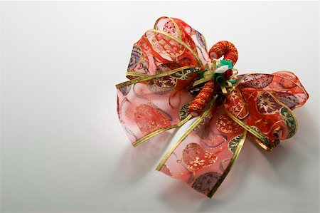 simsearch:400-05326104,k - close up photo of red christmas ribbon as decoration Stock Photo - Budget Royalty-Free & Subscription, Code: 400-03953197