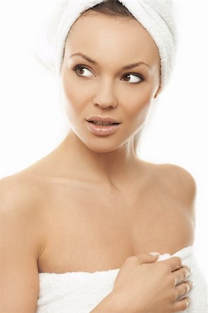 Portrait of Fresh and Beautiful brunette woman wearing white towel on her head Foto de stock - Super Valor sin royalties y Suscripción, Código: 400-03953549