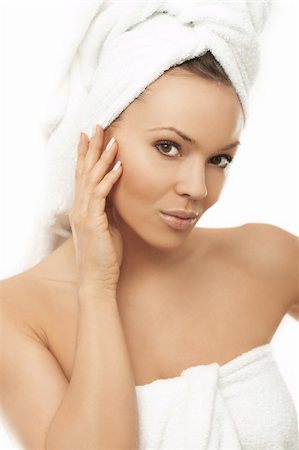 Portrait of Fresh and Beautiful brunette woman wearing white towel on her head Foto de stock - Super Valor sin royalties y Suscripción, Código: 400-03953550