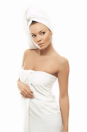 Portrait of Fresh and Beautiful brunette woman wearing white towel on her head Foto de stock - Super Valor sin royalties y Suscripción, Código: 400-03953567