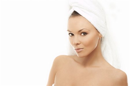 Portrait of Fresh and Beautiful brunette woman wearing white towel on her head Stock Photo - Budget Royalty-Free & Subscription, Code: 400-03953562