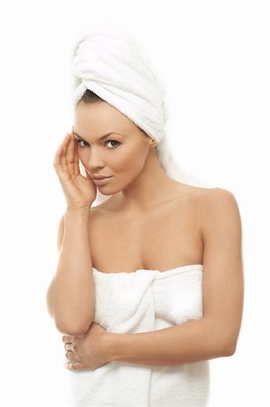 Portrait of Fresh and Beautiful brunette woman wearing white towel on her head Foto de stock - Super Valor sin royalties y Suscripción, Código: 400-03953570