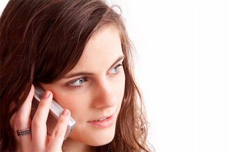 Head portrait of a pretty girl talking on cellphone Photographie de stock - Aubaine LD & Abonnement, Code: 400-03953682