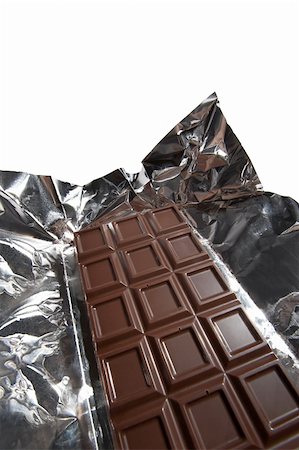 simsearch:825-05986203,k - Dark chocolate in a foil on a white background Stock Photo - Budget Royalty-Free & Subscription, Code: 400-03964008