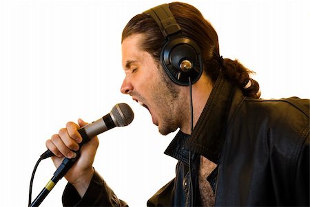 face man latino isolated - Profile of a young man in a leather jacket shouting in a microphone. Stock Photo - Budget Royalty-Free & Subscription, Code: 400-03964015