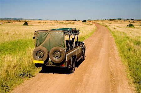 safari destination - Jeep on safari in African savannah, Kenya. Photographie de stock - Aubaine LD & Abonnement, Code: 400-03964097