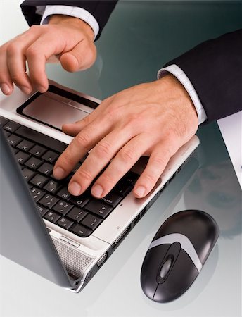 Male hands typing on a laptop computer. Stock Photo - Budget Royalty-Free & Subscription, Code: 400-03964323
