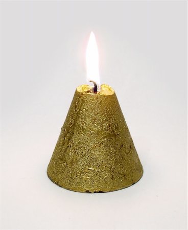 Golden Conical candle Fotografie stock - Microstock e Abbonamento, Codice: 400-03964414