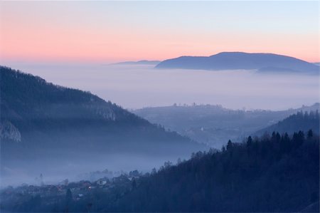 distance clear view - Morning view of a village between the mountains Photographie de stock - Aubaine LD & Abonnement, Code: 400-03964500