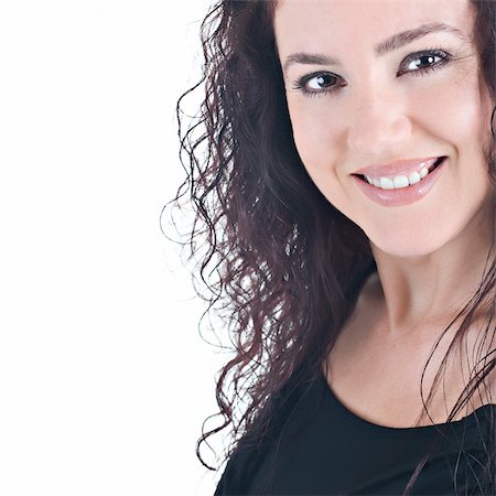 scale makeup woman - Portrait of a beautiful brunnette with curly hair, smiling. Isolated on white background. Foto de stock - Super Valor sin royalties y Suscripción, Código: 400-03964650