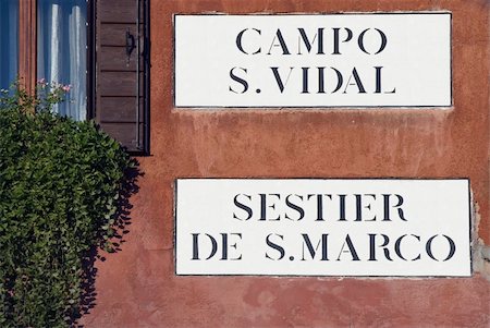 Venetian street sign near flower window Stock Photo - Budget Royalty-Free & Subscription, Code: 400-03964678