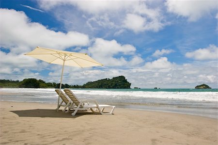 simsearch:6119-08062357,k - Two chairs and umbrella at the beach. Manuel Antonio, Costa Rica. Photographie de stock - Aubaine LD & Abonnement, Code: 400-03964751