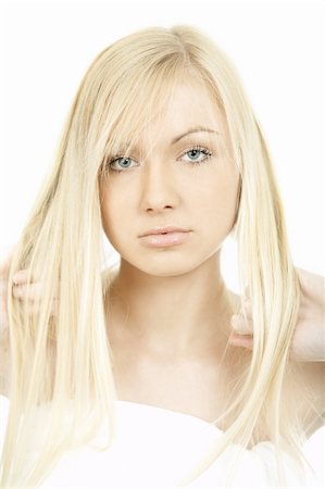 simsearch:400-05112444,k - Portrait of Fresh and Beautiful young blond woman playing with her hair Stock Photo - Budget Royalty-Free & Subscription, Code: 400-03964890