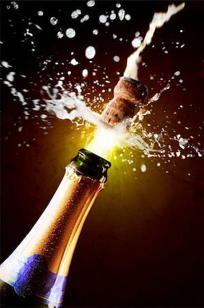 popping up - Close up of champagne cork popping Stock Photo - Budget Royalty-Free & Subscription, Code: 400-03965080