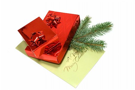 simsearch:400-03965193,k - Two red gift boxes with Christmas postal card and branch of fir-tree Stock Photo - Budget Royalty-Free & Subscription, Code: 400-03965189