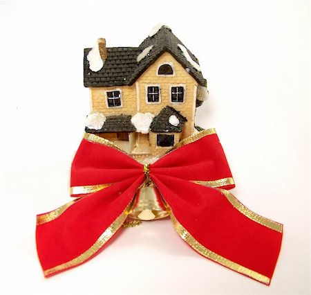 decor home new year - Winter toy-house with red bow Stock Photo - Budget Royalty-Free & Subscription, Code: 400-03965197